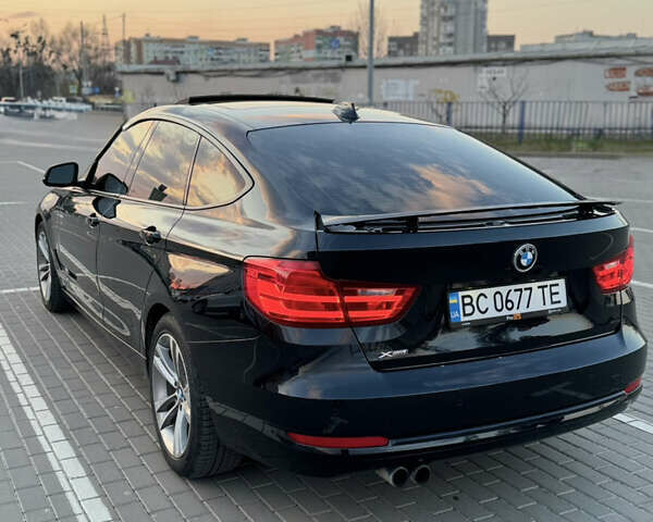 Чорний БМВ 3 Серія ГТ, об'ємом двигуна 2 л та пробігом 129 тис. км за 18900 $, фото 3 на Automoto.ua