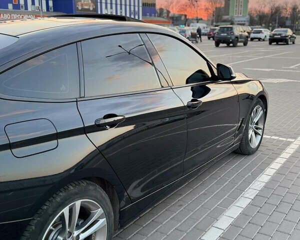 Чорний БМВ 3 Серія ГТ, об'ємом двигуна 2 л та пробігом 129 тис. км за 18900 $, фото 6 на Automoto.ua