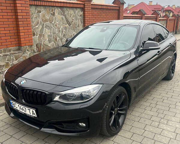 Черный БМВ 3 Серия ГТ, объемом двигателя 2 л и пробегом 170 тыс. км за 18700 $, фото 1 на Automoto.ua