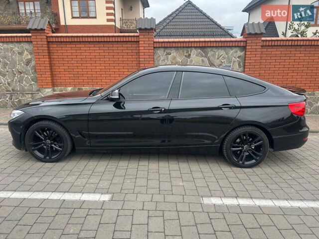 Черный БМВ 3 Серия ГТ, объемом двигателя 2 л и пробегом 170 тыс. км за 18700 $, фото 11 на Automoto.ua