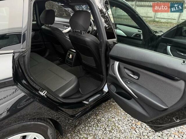 Черный БМВ 3 Серия ГТ, объемом двигателя 2 л и пробегом 225 тыс. км за 19999 $, фото 4 на Automoto.ua