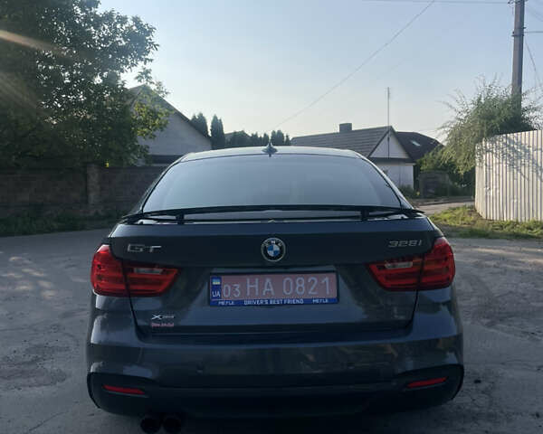 Сірий БМВ 3 Серія ГТ, об'ємом двигуна 2 л та пробігом 230 тис. км за 15899 $, фото 6 на Automoto.ua