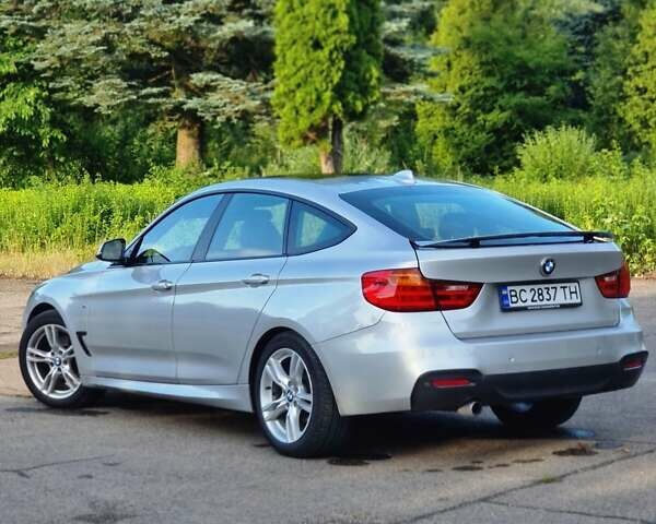 Серый БМВ 3 Серия ГТ, объемом двигателя 2 л и пробегом 290 тыс. км за 15200 $, фото 7 на Automoto.ua