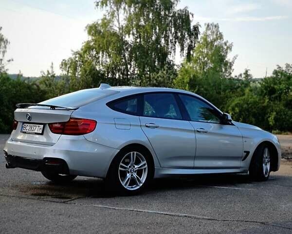 Серый БМВ 3 Серия ГТ, объемом двигателя 2 л и пробегом 290 тыс. км за 15200 $, фото 5 на Automoto.ua