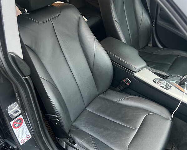 Серый БМВ 3 Серия ГТ, объемом двигателя 2 л и пробегом 230 тыс. км за 17000 $, фото 9 на Automoto.ua