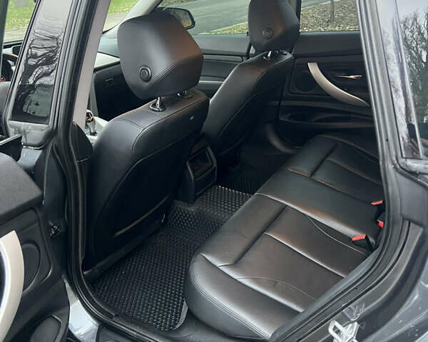 Серый БМВ 3 Серия ГТ, объемом двигателя 2 л и пробегом 230 тыс. км за 17000 $, фото 15 на Automoto.ua