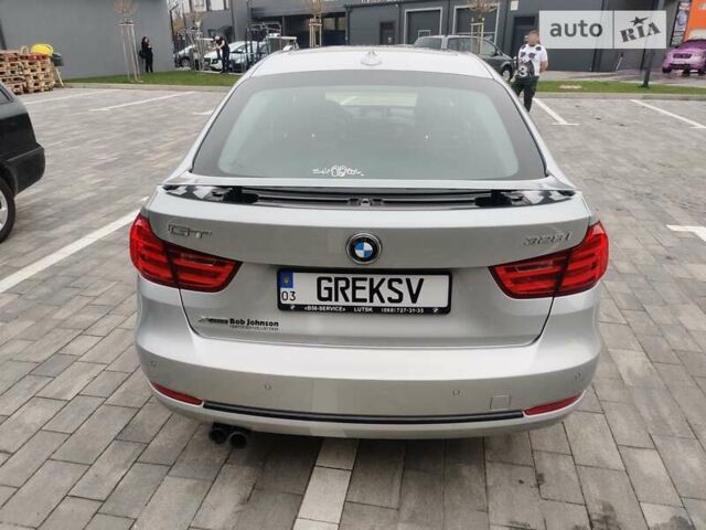 Серый БМВ 3 Серия ГТ, объемом двигателя 2 л и пробегом 180 тыс. км за 18000 $, фото 7 на Automoto.ua