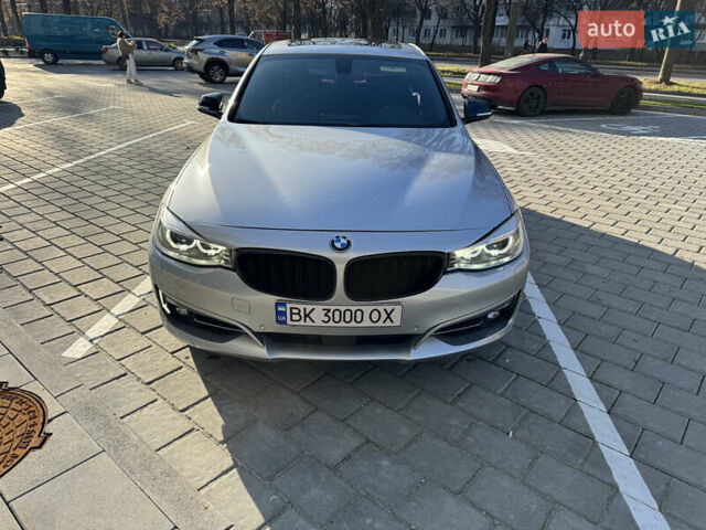 Серый БМВ 3 Серия ГТ, объемом двигателя 2.98 л и пробегом 149 тыс. км за 19000 $, фото 2 на Automoto.ua