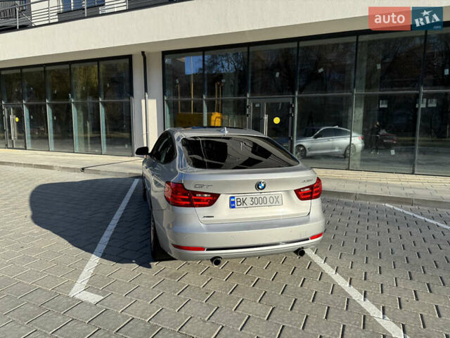 Серый БМВ 3 Серия ГТ, объемом двигателя 2.98 л и пробегом 149 тыс. км за 19000 $, фото 3 на Automoto.ua