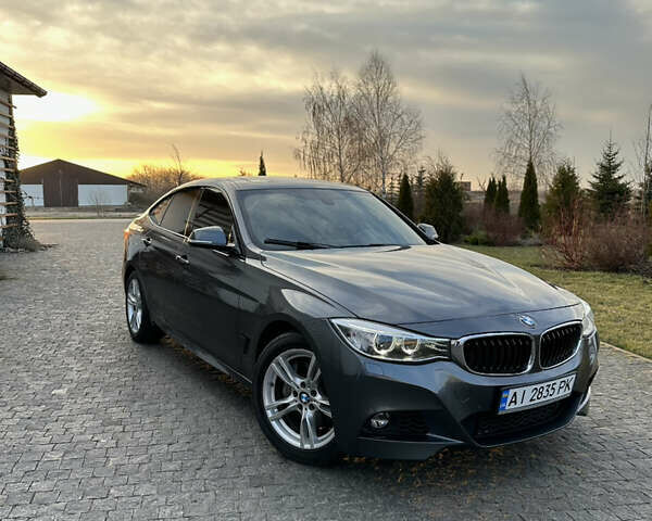 Серый БМВ 3 Серия ГТ, объемом двигателя 2.98 л и пробегом 168 тыс. км за 14000 $, фото 1 на Automoto.ua