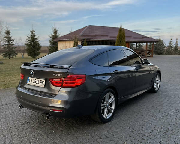 Серый БМВ 3 Серия ГТ, объемом двигателя 2.98 л и пробегом 168 тыс. км за 14000 $, фото 7 на Automoto.ua