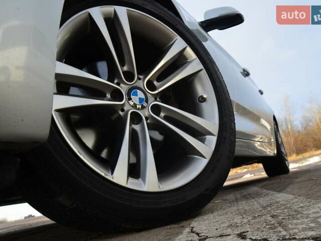 Сірий БМВ 3 Серія ГТ, об'ємом двигуна 2 л та пробігом 180 тис. км за 13888 $, фото 6 на Automoto.ua