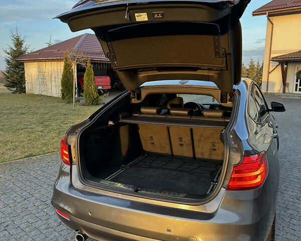 Серый БМВ 3 Серия ГТ, объемом двигателя 2.98 л и пробегом 168 тыс. км за 14000 $, фото 13 на Automoto.ua