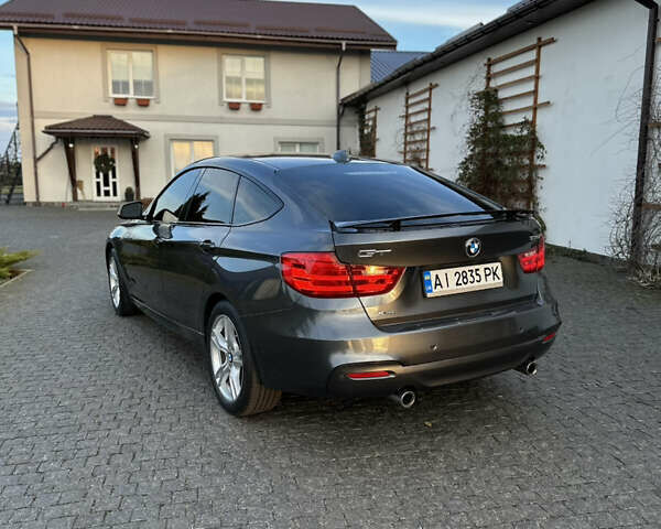 Серый БМВ 3 Серия ГТ, объемом двигателя 2.98 л и пробегом 168 тыс. км за 14000 $, фото 8 на Automoto.ua