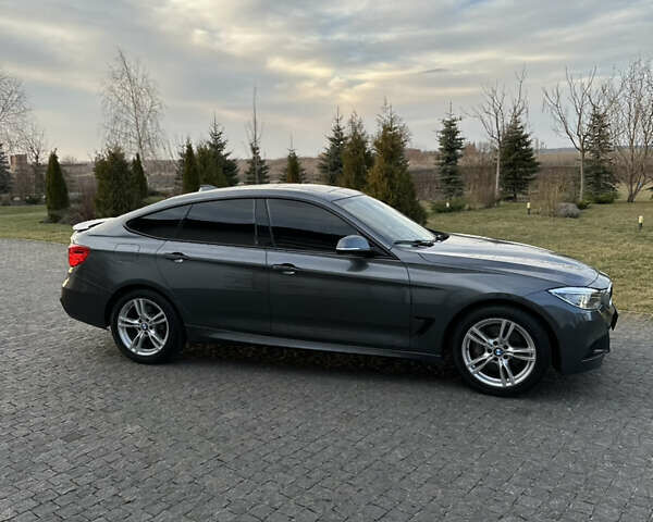 Серый БМВ 3 Серия ГТ, объемом двигателя 2.98 л и пробегом 168 тыс. км за 14000 $, фото 2 на Automoto.ua