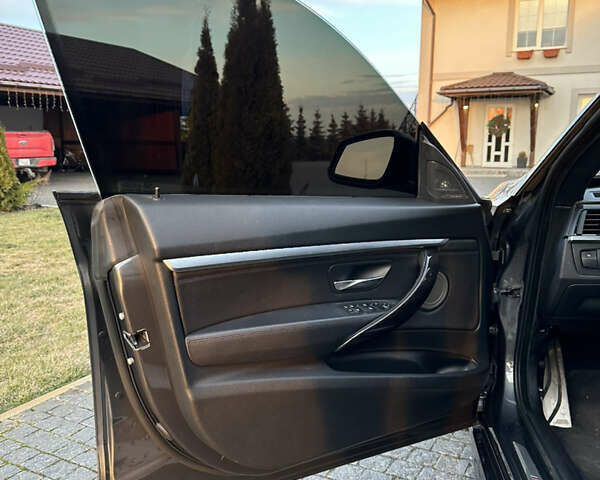 Серый БМВ 3 Серия ГТ, объемом двигателя 2.98 л и пробегом 168 тыс. км за 14000 $, фото 15 на Automoto.ua