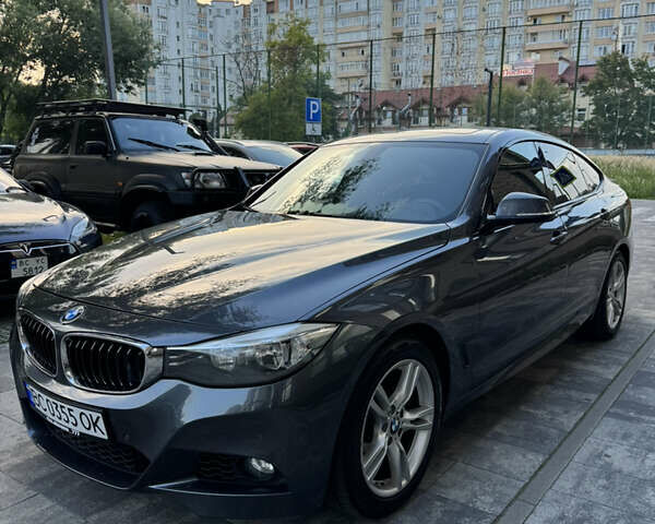 Серый БМВ 3 Серия ГТ, объемом двигателя 2 л и пробегом 198 тыс. км за 13999 $, фото 8 на Automoto.ua