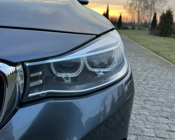 Серый БМВ 3 Серия ГТ, объемом двигателя 2.98 л и пробегом 168 тыс. км за 14000 $, фото 12 на Automoto.ua