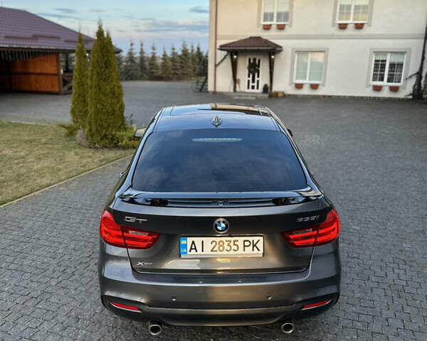 Серый БМВ 3 Серия ГТ, объемом двигателя 2.98 л и пробегом 168 тыс. км за 14000 $, фото 9 на Automoto.ua