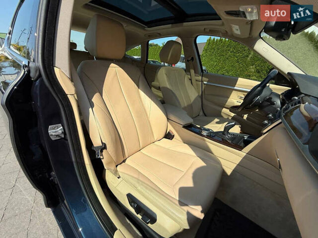 Синій БМВ 3 Серія ГТ, об'ємом двигуна 2 л та пробігом 200 тис. км за 15500 $, фото 24 на Automoto.ua