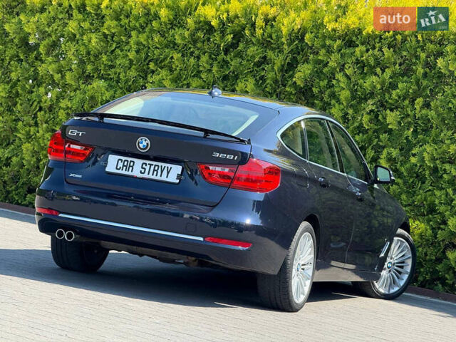 Синій БМВ 3 Серія ГТ, об'ємом двигуна 2 л та пробігом 200 тис. км за 15500 $, фото 17 на Automoto.ua