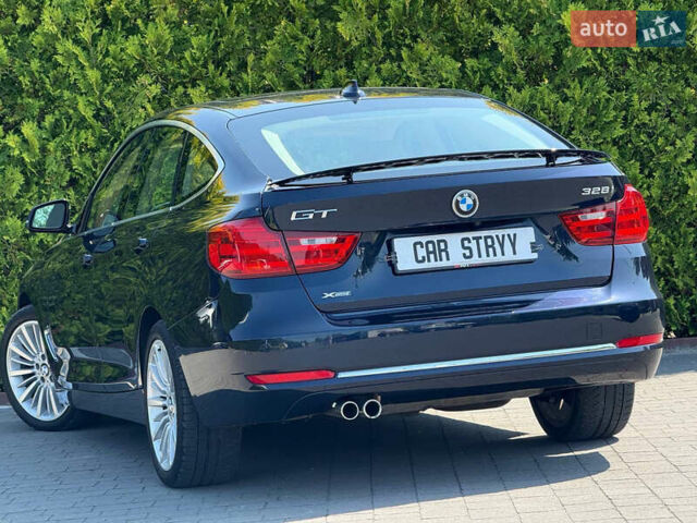 Синій БМВ 3 Серія ГТ, об'ємом двигуна 2 л та пробігом 200 тис. км за 15500 $, фото 6 на Automoto.ua