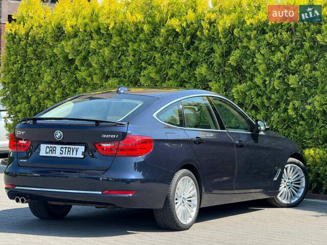 Синій БМВ 3 Серія ГТ, об'ємом двигуна 2 л та пробігом 200 тис. км за 15500 $, фото 3 на Automoto.ua