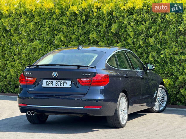 Синій БМВ 3 Серія ГТ, об'ємом двигуна 2 л та пробігом 200 тис. км за 15500 $, фото 10 на Automoto.ua