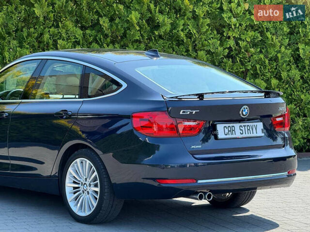 Синій БМВ 3 Серія ГТ, об'ємом двигуна 2 л та пробігом 200 тис. км за 15500 $, фото 5 на Automoto.ua