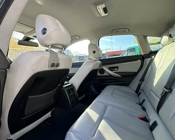 Синій БМВ 3 Серія ГТ, об'ємом двигуна 2 л та пробігом 350 тис. км за 14500 $, фото 11 на Automoto.ua