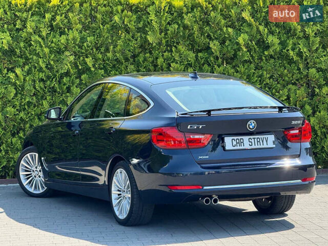 Синій БМВ 3 Серія ГТ, об'ємом двигуна 2 л та пробігом 200 тис. км за 15500 $, фото 15 на Automoto.ua