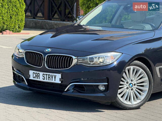 Синій БМВ 3 Серія ГТ, об'ємом двигуна 2 л та пробігом 200 тис. км за 15500 $, фото 16 на Automoto.ua