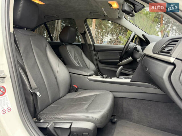 Білий БМВ 3 Серія, об'ємом двигуна 2 л та пробігом 106 тис. км за 13350 $, фото 36 на Automoto.ua