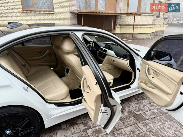 Белый БМВ 3 Серия, объемом двигателя 2 л и пробегом 175 тыс. км за 13999 $, фото 88 на Automoto.ua