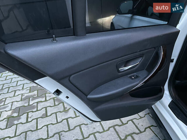 Білий БМВ 3 Серія, об'ємом двигуна 2 л та пробігом 207 тис. км за 14800 $, фото 31 на Automoto.ua