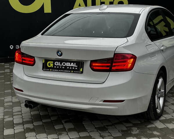 Білий БМВ 3 Серія, об'ємом двигуна 2 л та пробігом 174 тис. км за 9500 $, фото 24 на Automoto.ua