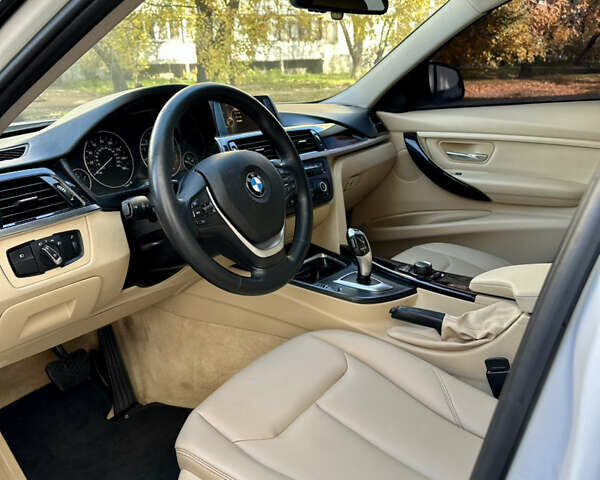 Білий БМВ 3 Серія, об'ємом двигуна 2 л та пробігом 175 тис. км за 12700 $, фото 6 на Automoto.ua
