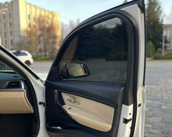 Белый БМВ 3 Серия, объемом двигателя 2 л и пробегом 178 тыс. км за 13800 $, фото 13 на Automoto.ua