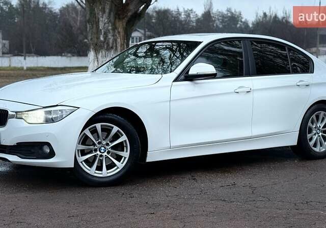 Белый БМВ 3 Серия, объемом двигателя 2 л и пробегом 159 тыс. км за 13500 $, фото 1 на Automoto.ua