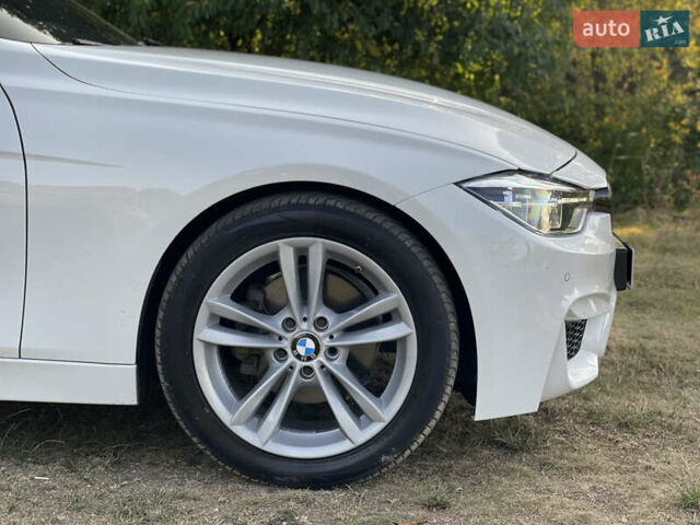 Білий БМВ 3 Серія, об'ємом двигуна 2 л та пробігом 170 тис. км за 14000 $, фото 26 на Automoto.ua