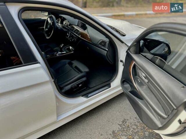 Білий БМВ 3 Серія, об'ємом двигуна 2 л та пробігом 72 тис. км за 18999 $, фото 23 на Automoto.ua