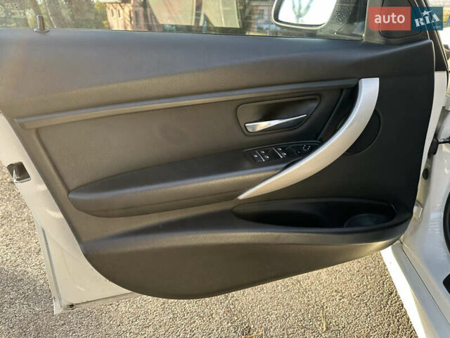 Білий БМВ 3 Серія, об'ємом двигуна 2 л та пробігом 162 тис. км за 14900 $, фото 32 на Automoto.ua