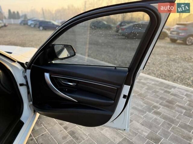 Белый БМВ 3 Серия, объемом двигателя 2 л и пробегом 245 тыс. км за 11399 $, фото 26 на Automoto.ua