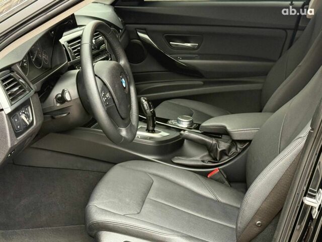 Чорний БМВ 3 Серія, об'ємом двигуна 2 л та пробігом 142 тис. км за 22990 $, фото 11 на Automoto.ua