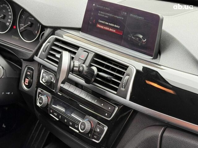 Чорний БМВ 3 Серія, об'ємом двигуна 2 л та пробігом 142 тис. км за 22990 $, фото 23 на Automoto.ua