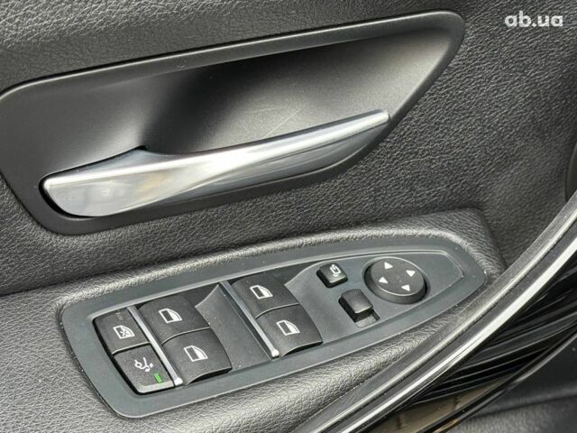 Чорний БМВ 3 Серія, об'ємом двигуна 2 л та пробігом 142 тис. км за 22990 $, фото 13 на Automoto.ua