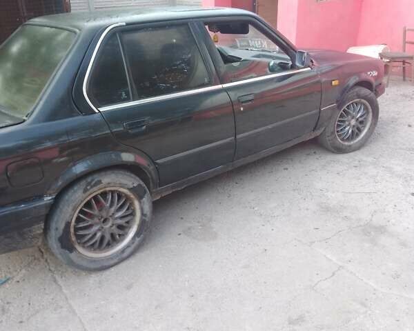 Чорний БМВ 3 Серія, об'ємом двигуна 1.8 л та пробігом 322 тис. км за 1684 $, фото 1 на Automoto.ua