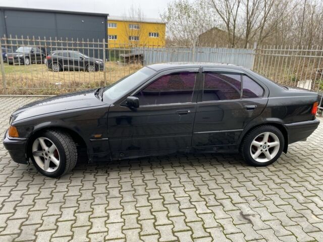 Черный БМВ 3 Серия, объемом двигателя 1.6 л и пробегом 300 тыс. км за 1700 $, фото 1 на Automoto.ua