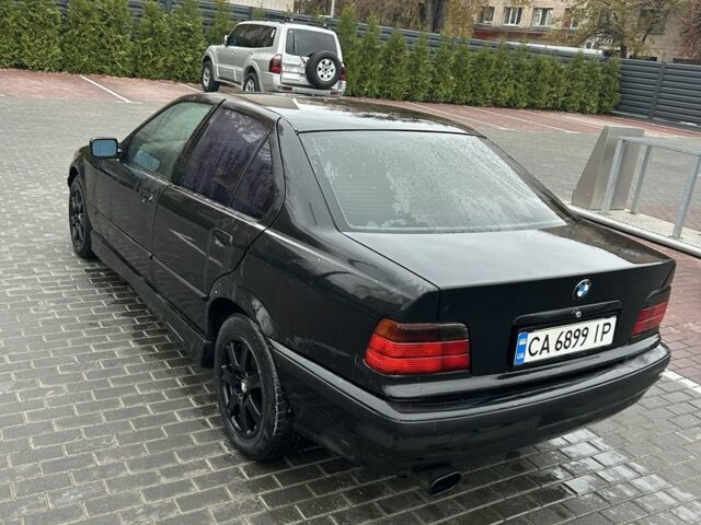 Чорний БМВ 3 Серія, об'ємом двигуна 1.6 л та пробігом 256 тис. км за 2350 $, фото 3 на Automoto.ua