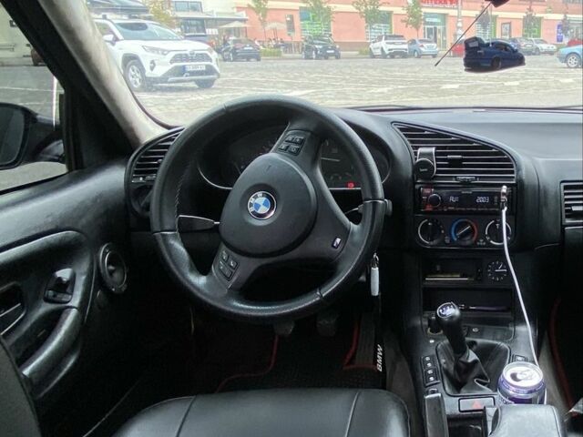 Черный БМВ 3 Серия, объемом двигателя 1.8 л и пробегом 300 тыс. км за 4000 $, фото 11 на Automoto.ua